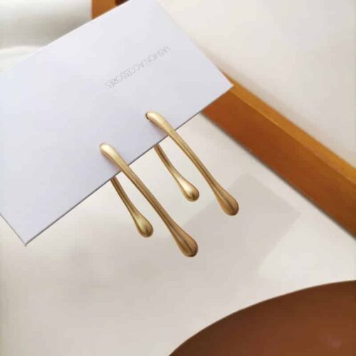 Dripping In Gold Paint Drip Earrings - Image 2