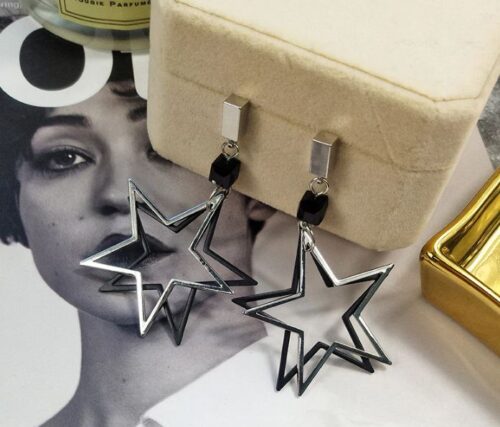 Double Stardom | Silver & Black Star Earrings - Image 4