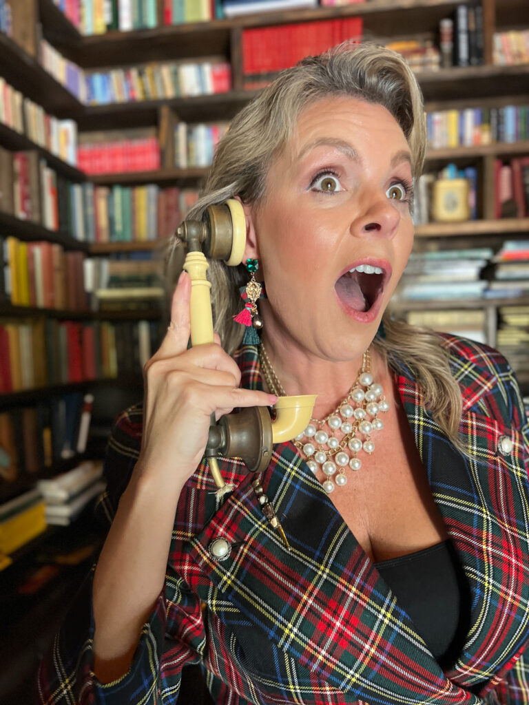 Christi Tasker on telephone