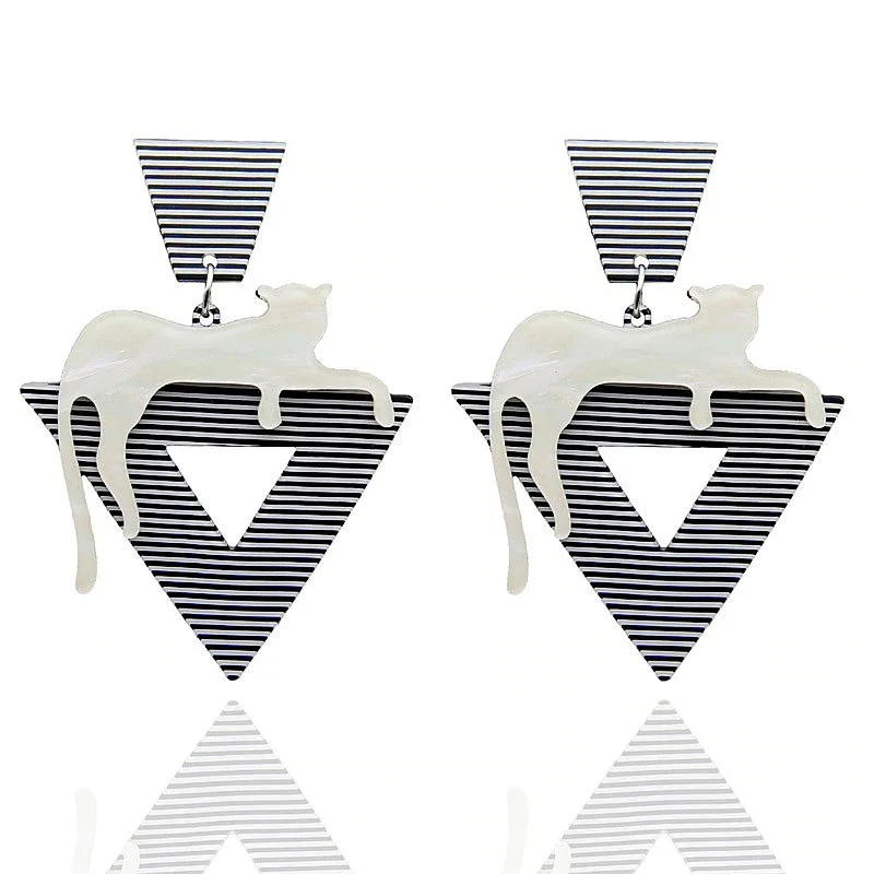leopard earrings, cat earrings, abstract earrings, triangle earrings, oversized earrings. statement earrings, cat earrings